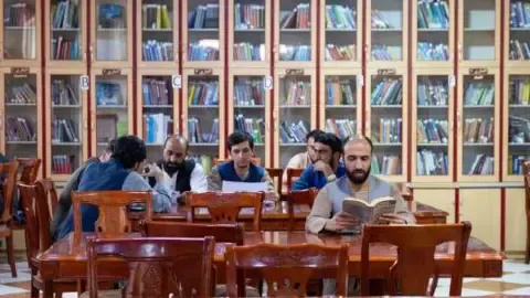 Afghanistan's rulers prohibit books produced by female authors from the nation's colleges
